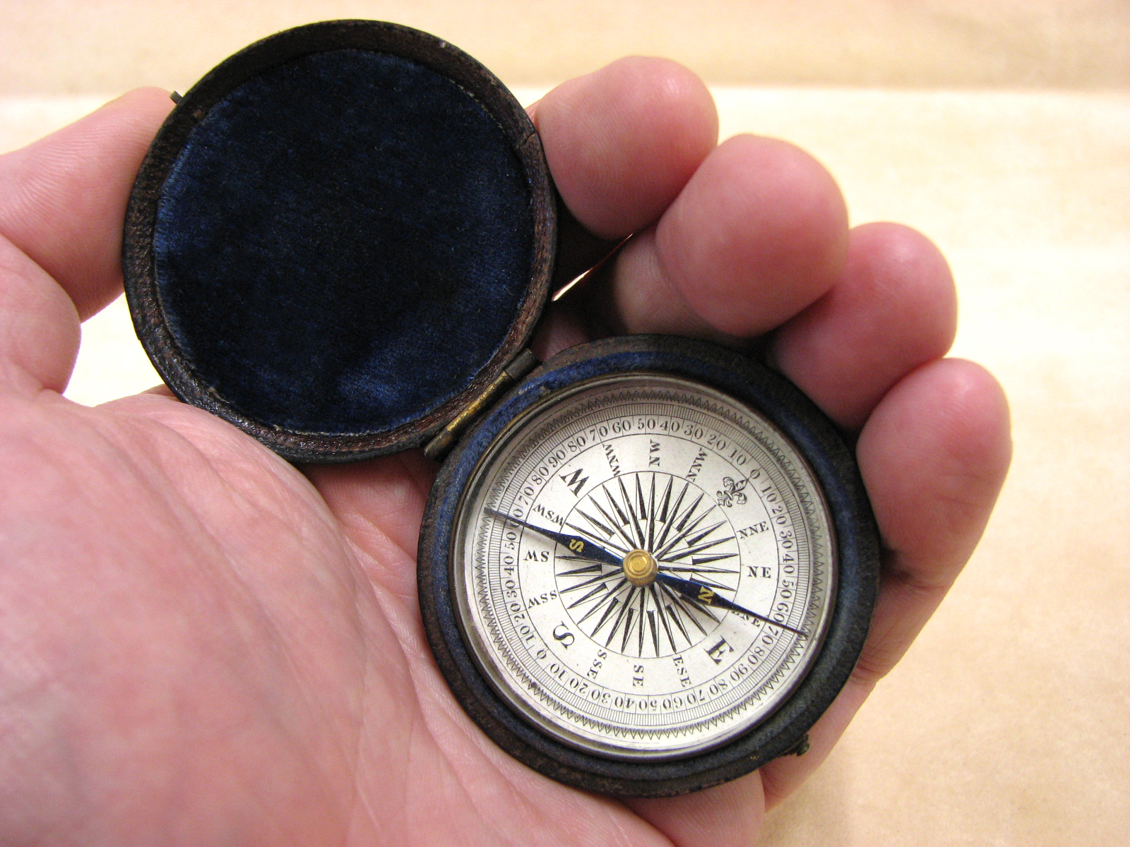 Early Victorian pocket compass in leather covered outer case circa 1860